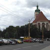 Гiпатэтычная графiчная рэканструкцыя былога фарнага касцёла (фара Вiтаўта) на перыяд пачатку XVIIст. (першапачатковы выгляд мураванай святынi да пазнейшых перабудоў) 3D-мадэль, фотамантаж by А.Невар, арыгiнальныя здымкi by А. Серада - 2015г.