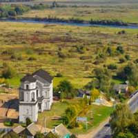 Быхаў. Графiчная рэканструкцыя былога касцёла канонiкаў латэранскiх пад тытулам Беззаганнага Зачацця Найсвяцейшай Дзевы Марыі, Св. Казiмiра i Св. Аўгусцiна. Выгляд з вышынi палёту квадракоптэра. Арыгiнальнае фота - Алег Караваеў, 2015г.; 3d мадэль, фотамантаж by А.Невар, 2019г.