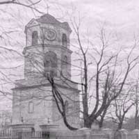 Быхаў. Выява званiцы былога касцёла канонiкаў латэранскiх пад тытулам Беззаганнага Зачацця Найсвяцейшай Дзевы Марыі, Св. Казiмiра i Св. Аўгусцiна. Выгляд на пачатак XXст.; Фота 1917г., крынiца - Юры Шкапляроў, эл. архіў, апублiкавана - бел. вiкiпедыя 