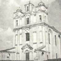 Княжыцы. Выява галоўнага фасада былога касцёла св.Антонiя дамiнiканскага каляштара пасля перабудовы пад праваслаўную царкву. Фота да 1950г., Апублiкавана - Зьміцер Корх, сайт Radzima,org. Электронны рэсурс - https://wikipedia.org