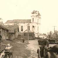 Княжыцы. Выява бакавога фасада былога касцёла св.Антонiя дамiнiканскага каляштара пасля перабудовы пад праваслаўную царкву. Фота часоў Другой сусветнай вайны (1941г.), Крынiца - iнтэрнэт аукцыён ebay, de . Электронны рэсурс - https://wikipedia.org